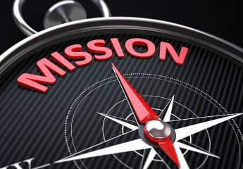 3d render image.  Compass needle pointing the green word mission.